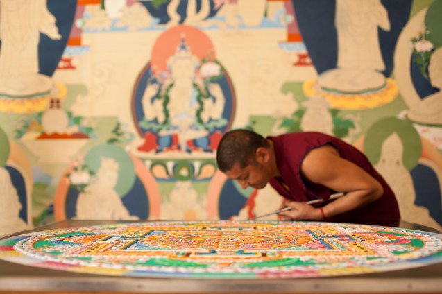 hanging canvas in photos by Tibetan thangka master, Tashi Dhargyal. 